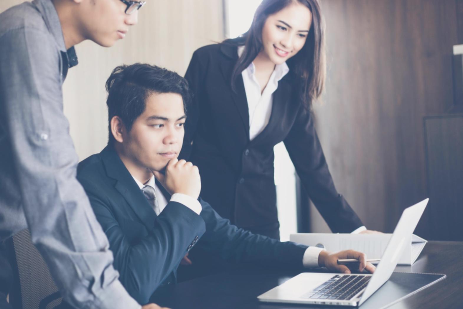 Student workspace at FluxIsIgnita showing mobile testing devices and optimization tools